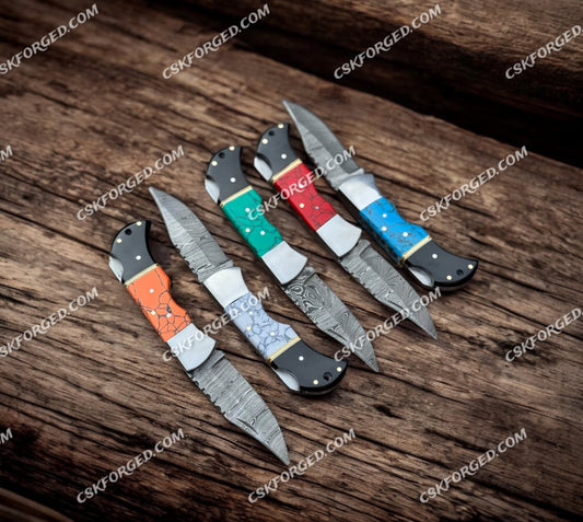 Handcrafted Damascus Steel Folding Knife – Vibrant Inlay Handle