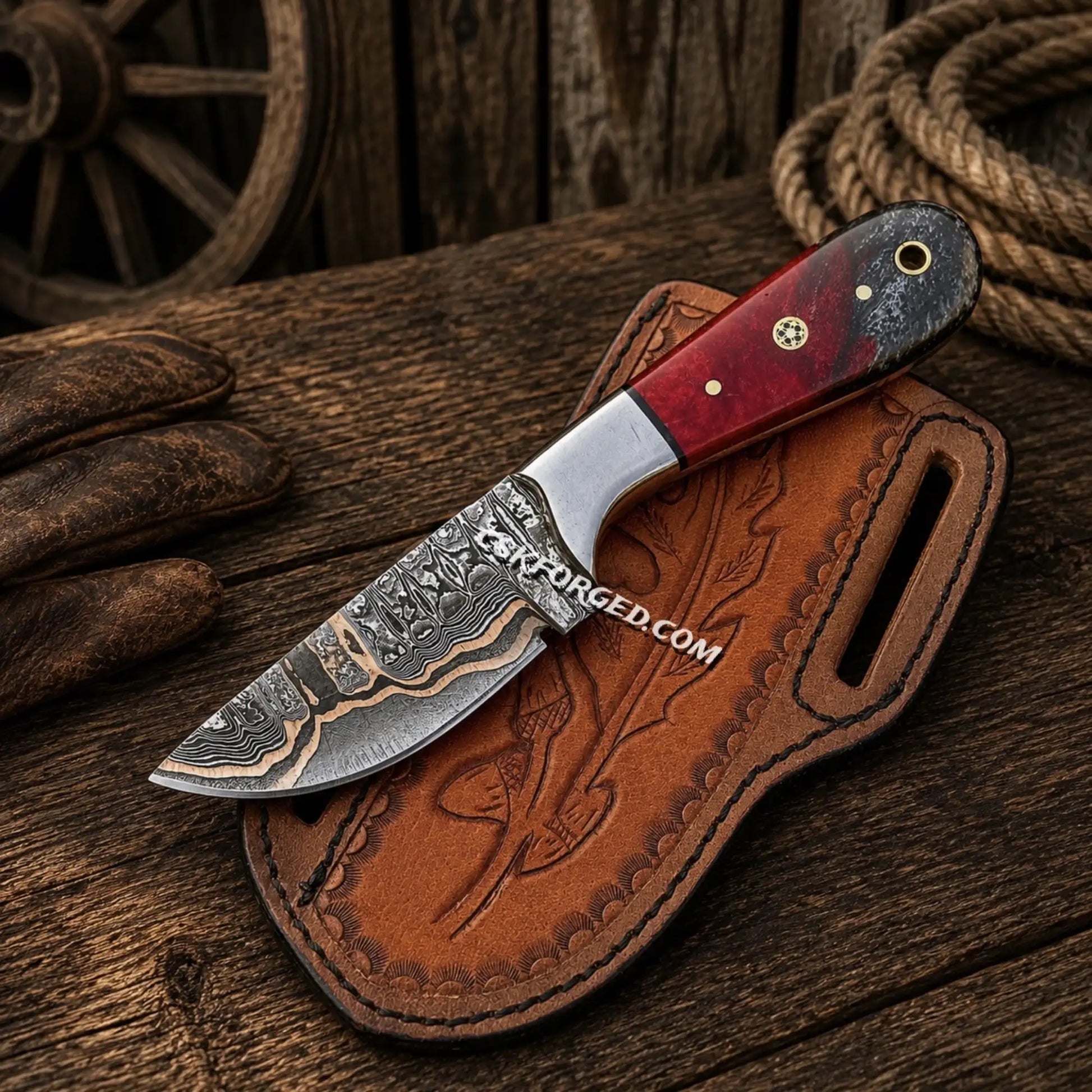 Handmade Copper Damascus ranch belt knife with epoxy resin handle and leather sheath.