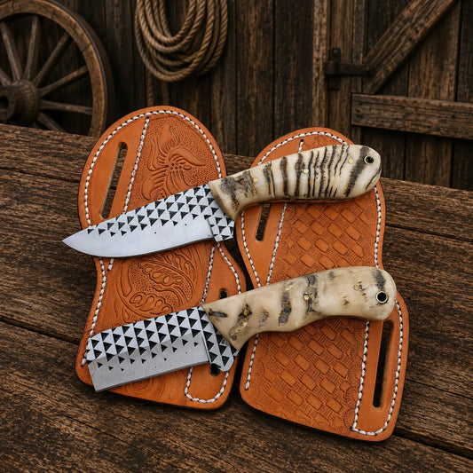 Cowboy Bull Cutter and Skinner Knife Set with Ferrier rasp steel blades and ram horn handles.