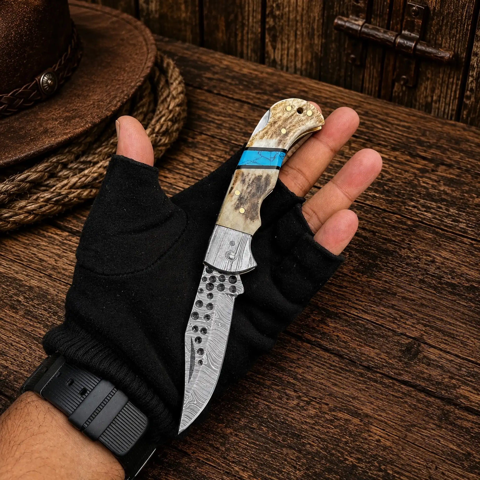 Handmade Cowboy Damascus Steel Folding Pocket Knife with natural antler horn handle, turquoise inlay, and razor-sharp patterned Damascus blade by CSKFORGED.